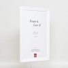 Dřevěný rám s efektem Top N bílý 25x35 cm antireflexní sklo